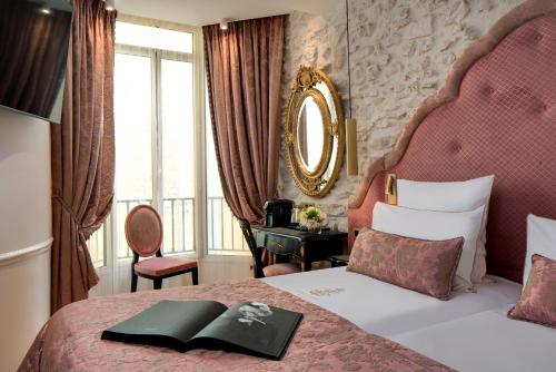 Habitación Doble Deluxe - 1 o 2 camas del hotel Kleber Paris and Spa. Foto 2