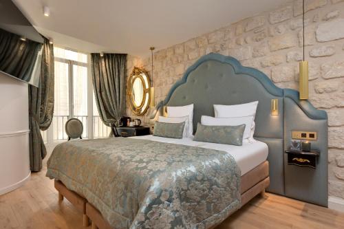 Habitación Doble Deluxe - 1 o 2 camas del hotel Kleber Paris and Spa. Foto 6
