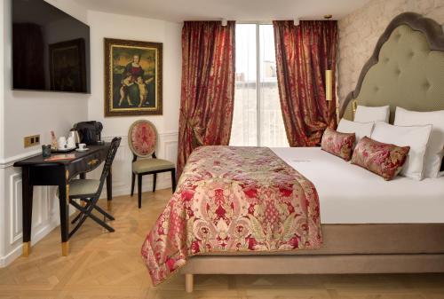 Suite Junior con bañera de hidromasaje y balcón del hotel Kleber Paris and Spa. Foto 5