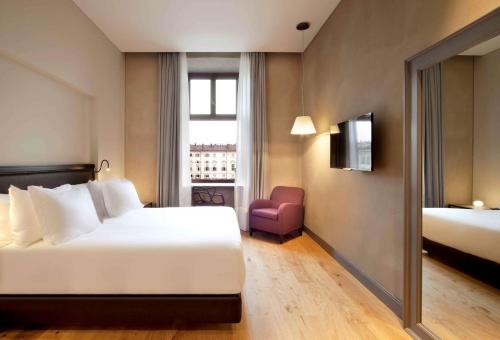 Habitación Doble Superior con vistas a la ciudad - 1 o 2 camas del hotel Nh Collection Torino Piazza Carlina. Foto 1