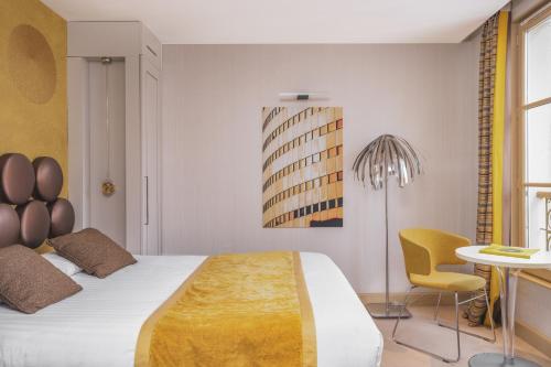 Habitación Doble Deluxe del hotel Le Petit Paris. Foto 2