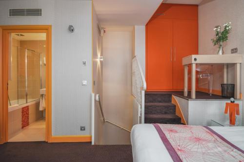 Habitación cuádruple del hotel Le Petit Paris