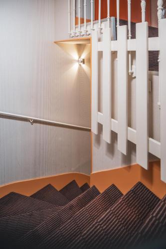 Habitación cuádruple del hotel Le Petit Paris. Foto 1