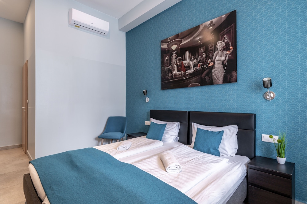Habitación estándar con 1 cama doble o 2 individuales del hotel Full Moon. Foto 3