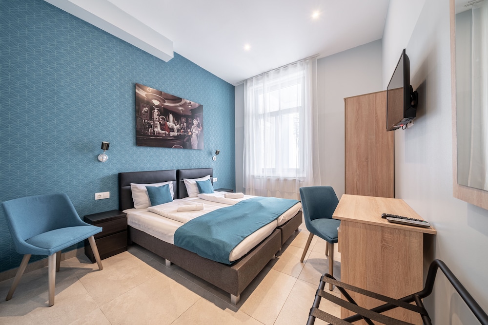 Habitación estándar con 1 cama doble o 2 individuales del hotel Full Moon. Foto 4