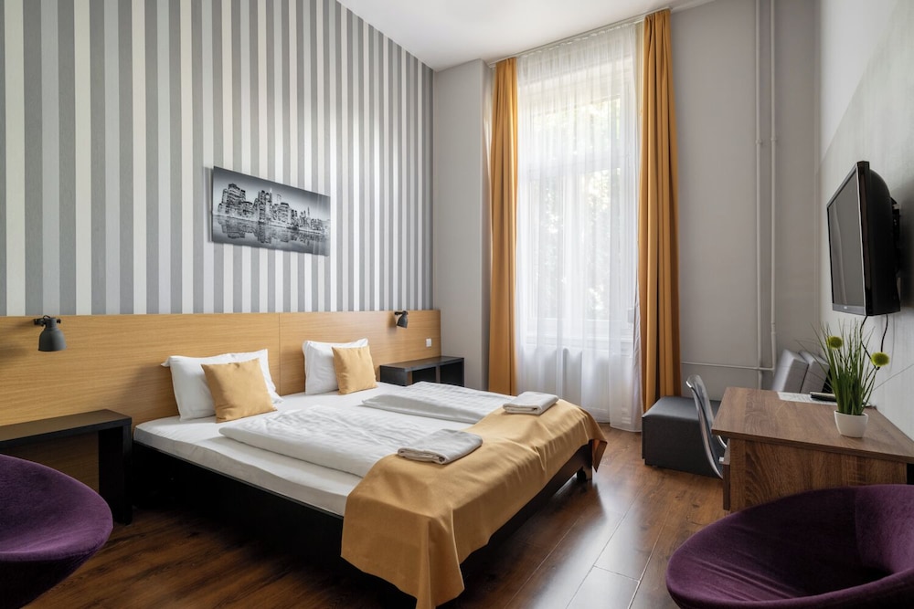 Habitación estándar con 1 cama doble o 2 individuales del hotel Full Moon. Foto 8