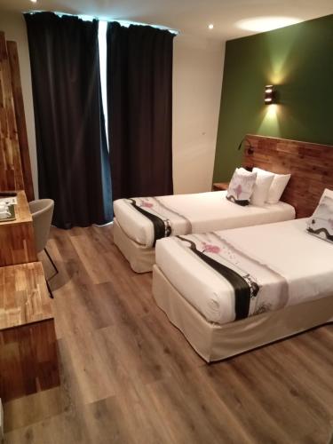 Habitación Doble - 2 camas del hotel Hotel Modern Est. Foto 2