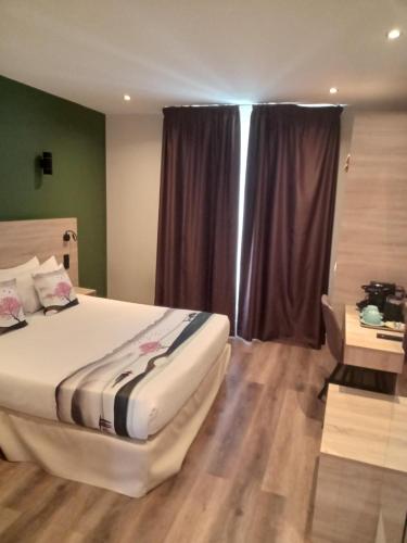 Habitación Clásica del hotel Hotel Modern Est. Foto 9