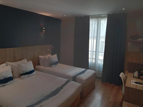 Habitación Triple del hotel Hotel Modern Est