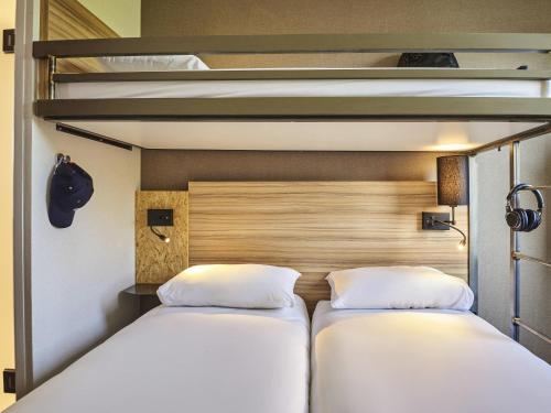 Habitación Doble Estándar con litera del hotel greet Hotel Paris Nord 18ème. Foto 1