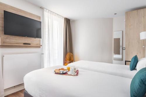 Habitación Doble - 2 camas del hotel Courcelles Médéric. Foto 3