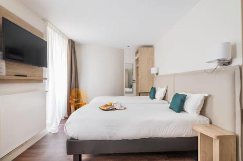 Habitación Doble - 2 camas del hotel Courcelles Médéric. Foto 4