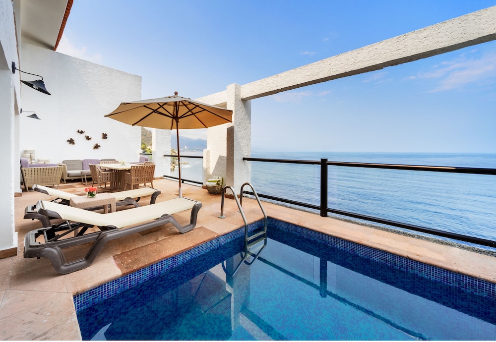 Suite de un Dormitorio con Piscina Privada y Cama King del hotel Dreams Puerto Vallarta Resort & Spa. Foto 3