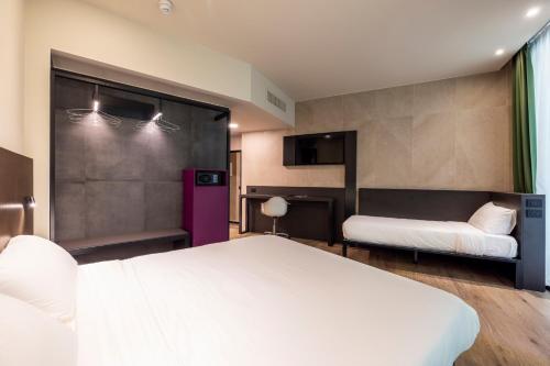 Habitación Triple del hotel Degli Arcimboldi. Foto 4