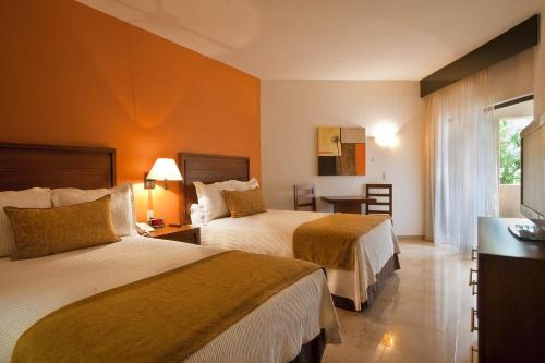 Habitación Doble Deluxe del hotel Canto Del Sol Puerto Vallarta All Inclusive. Foto 1