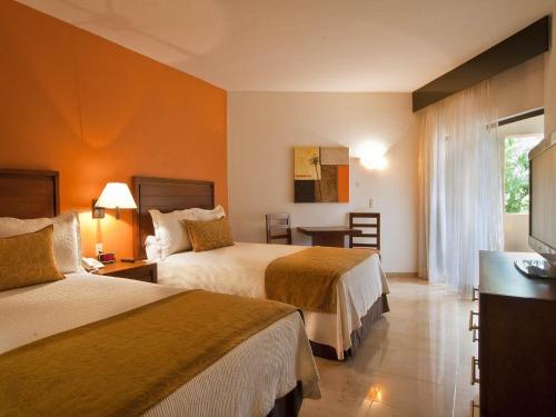 Habitación Doble Deluxe del hotel Canto Del Sol Puerto Vallarta All Inclusive. Foto 2