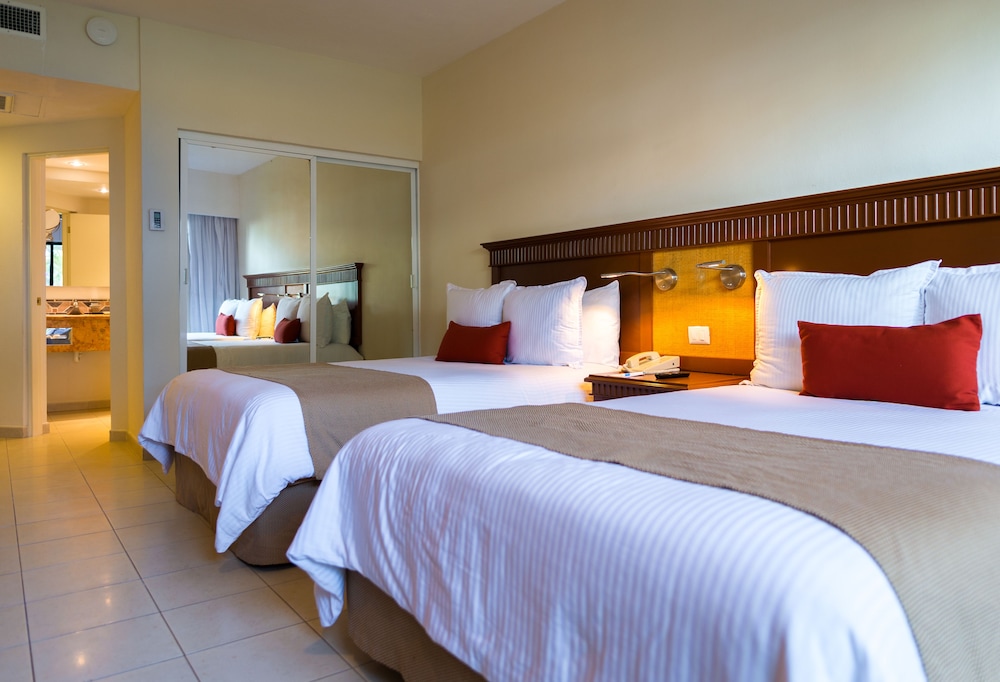 Habitación superior, vistas al jardín del hotel The Reef Coco Beach and Spa- Optional All Inclusive. Foto 1