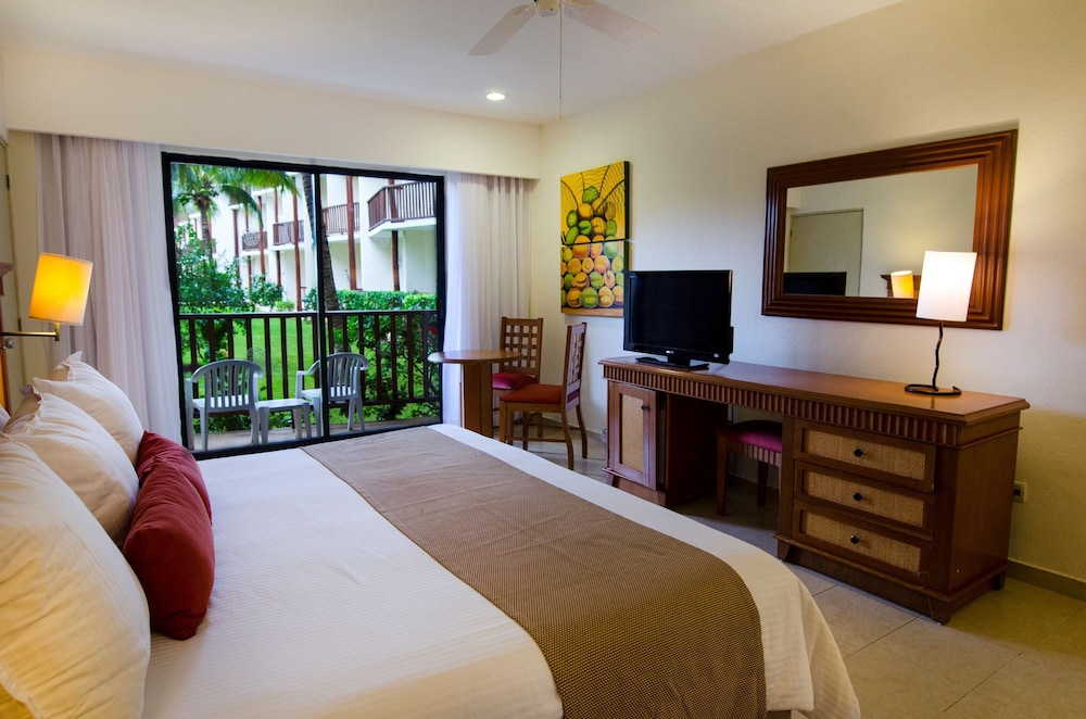 Habitación superior, vistas al jardín del hotel The Reef Coco Beach and Spa- Optional All Inclusive. Foto 2