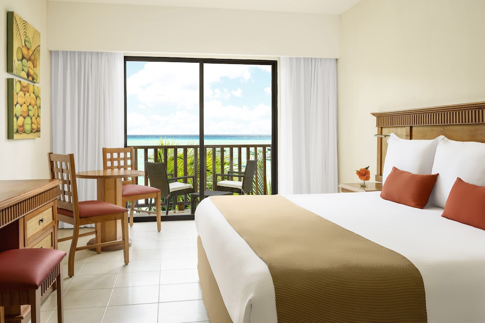Habitación Premium, vistas parciales al mar del hotel The Reef Coco Beach and Spa- Optional All Inclusive. Foto 9