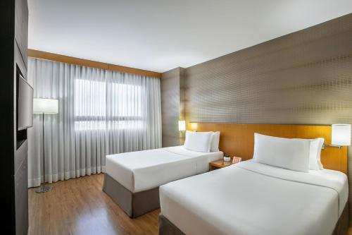 Habitación Doble Estándar - 2 camas del hotel Brasil 21 Suites Affiliated By Melia. Foto 1