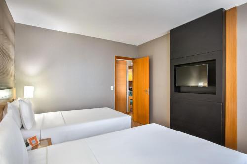 Habitación Doble Estándar - 2 camas del hotel Brasil 21 Suites Affiliated By Melia. Foto 2