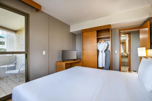 Habitación Premium - Cama extragrande del hotel Brasil 21 Suites Affiliated By Melia. Foto 8