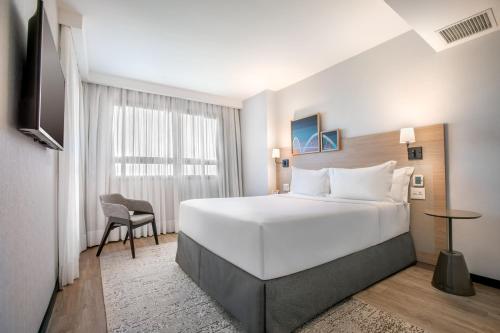 Suite Junior Premium - Cama extragrande del hotel Brasil 21 Suites Affiliated By Melia
