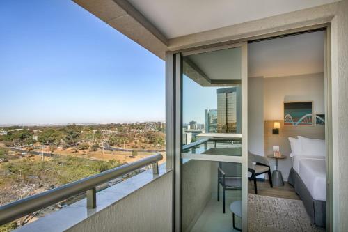 Suite Junior Premium - Cama extragrande del hotel Brasil 21 Suites Affiliated By Melia. Foto 3