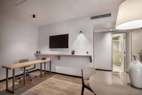 Suite Junior Premium - Cama extragrande del hotel Brasil 21 Suites Affiliated By Melia. Foto 7