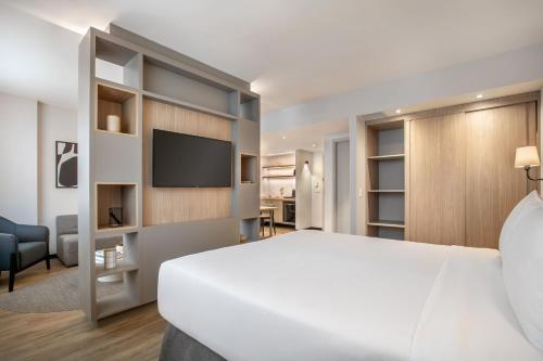 Suite Junior Executive con cama extragrande del hotel Brasil 21 Suites Affiliated By Melia. Foto 1