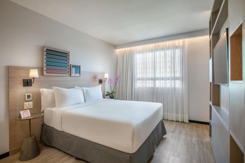 Suite Junior Executive con cama extragrande del hotel Brasil 21 Suites Affiliated By Melia. Foto 2