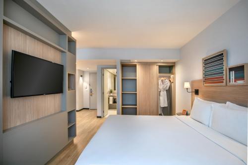 Suite Junior Executive con cama extragrande del hotel Brasil 21 Suites Affiliated By Melia. Foto 3