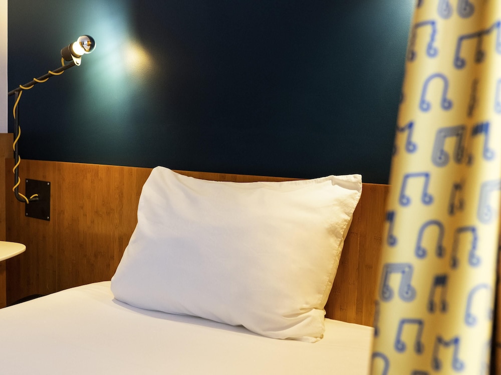 Habitación estándar con una cama individual del hotel ibis Styles Nancy Centre Gare. Foto 4