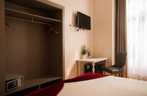 Habitación Doble - 1 o 2 camas del hotel Lisbon Arsenal Suites. Foto 5