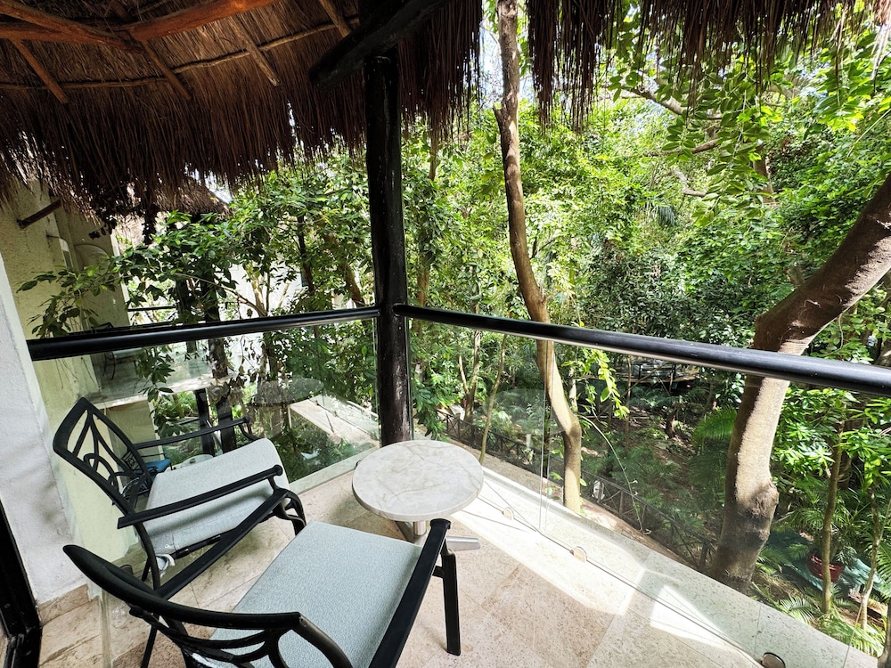 Habitación superior, 1 cama de matrimonio grande del hotel The Reef Playacar Resort and Spa - Optional All Inclusive. Foto 3