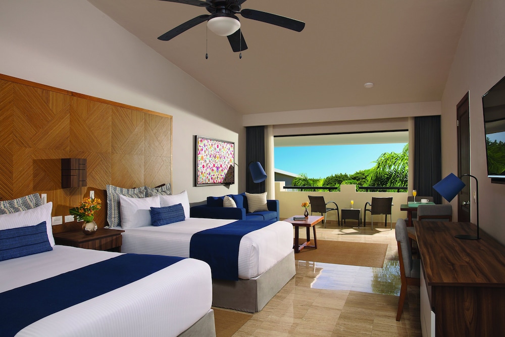 Two - Bedroom Family Suite Tropical View del hotel Dreams Sapphire Resort and Spa - All Inclusive. Foto 2