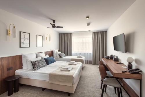 Habitación Triple Business del hotel Airinn Vilnius. Foto 3