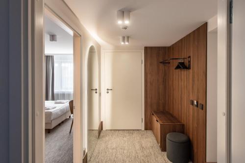 Habitación Familiar Business del hotel Airinn Vilnius. Foto 1