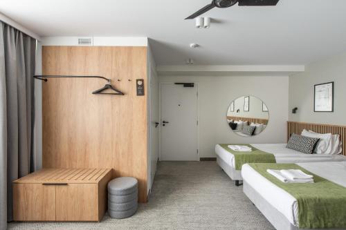 Habitación Triple Estándar del hotel Airinn Vilnius. Foto 3