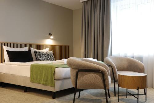 Habitación Confort Estándar del hotel Airinn Vilnius. Foto 4