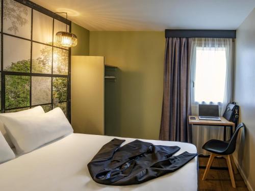Suite Familiar Estándar con 2 habitaciones comunicadas del hotel ibis Styles Parc des Expositions de Villepinte. Foto 1