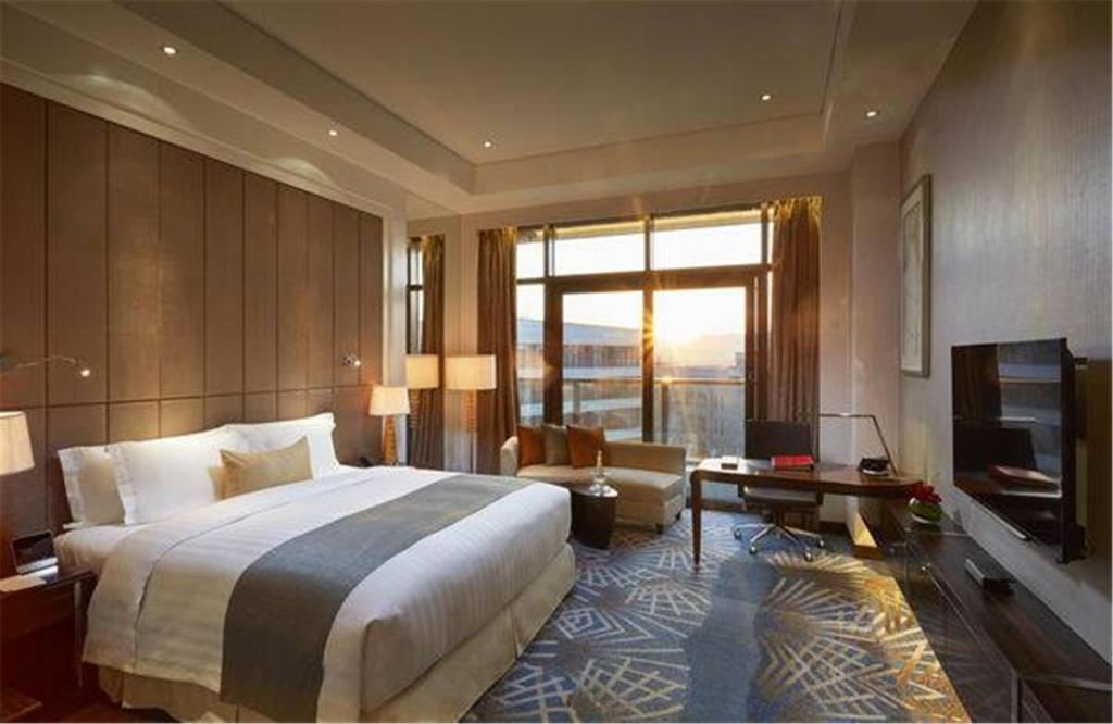 Red Level Deluxe Room del hotel Gran Melia Xian. Foto 1