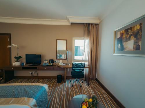 Habitación Doble Deluxe - 2 camas del hotel Copthorne Downtown Abu Dhabi. Foto 3