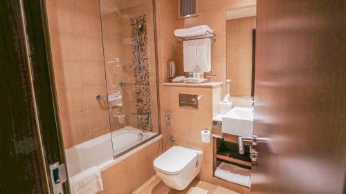 One Bedroom Apartment with Kitchenette del hotel Copthorne Downtown Abu Dhabi. Foto 1