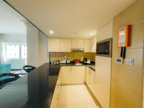 One Bedroom Apartment with Kitchenette del hotel Copthorne Downtown Abu Dhabi. Foto 8