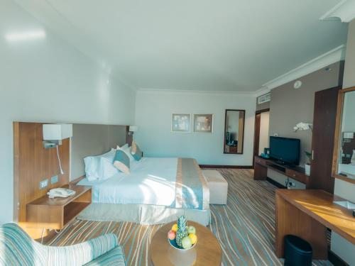 Habitación Club con acceso al salón executive del hotel Copthorne Downtown Abu Dhabi. Foto 3