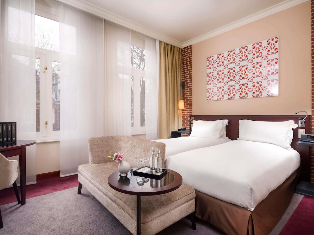 HABITACIÓN SUPERIOR - 1 Cama Queen - VISTAS AL JARDÍN, PATIO INTERIOR O A LA CIUDAD del hotel Sofitel Legend The Grand Amsterdam. Foto 3