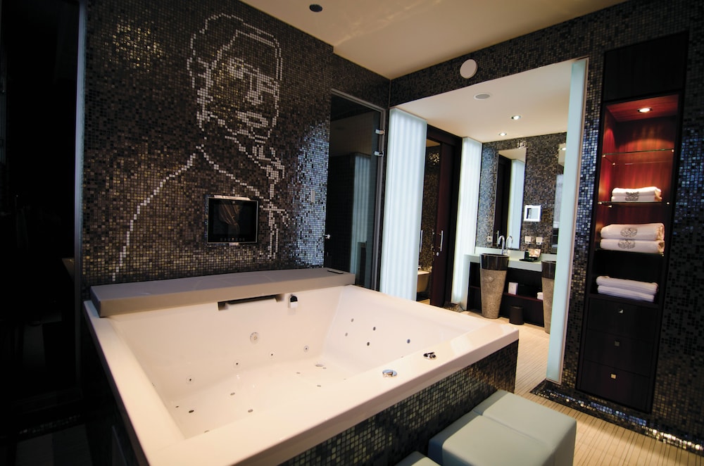 SUITE ÓPERA - 1 Cama King - SERVICIO DE MAYORDOMO; VISTAS AL JARDÍN O AL PATIO INTERIOR; SALÓN INDEPENDIENTE del hotel Sofitel Legend The Grand Amsterdam. Foto 8