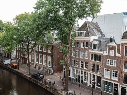SUITE PRESTIGE - 1 Cama King Size - Servicio de Mayordomo - Vistas al Canal - Salón Independiente del hotel Sofitel Legend The Grand Amsterdam. Foto 7