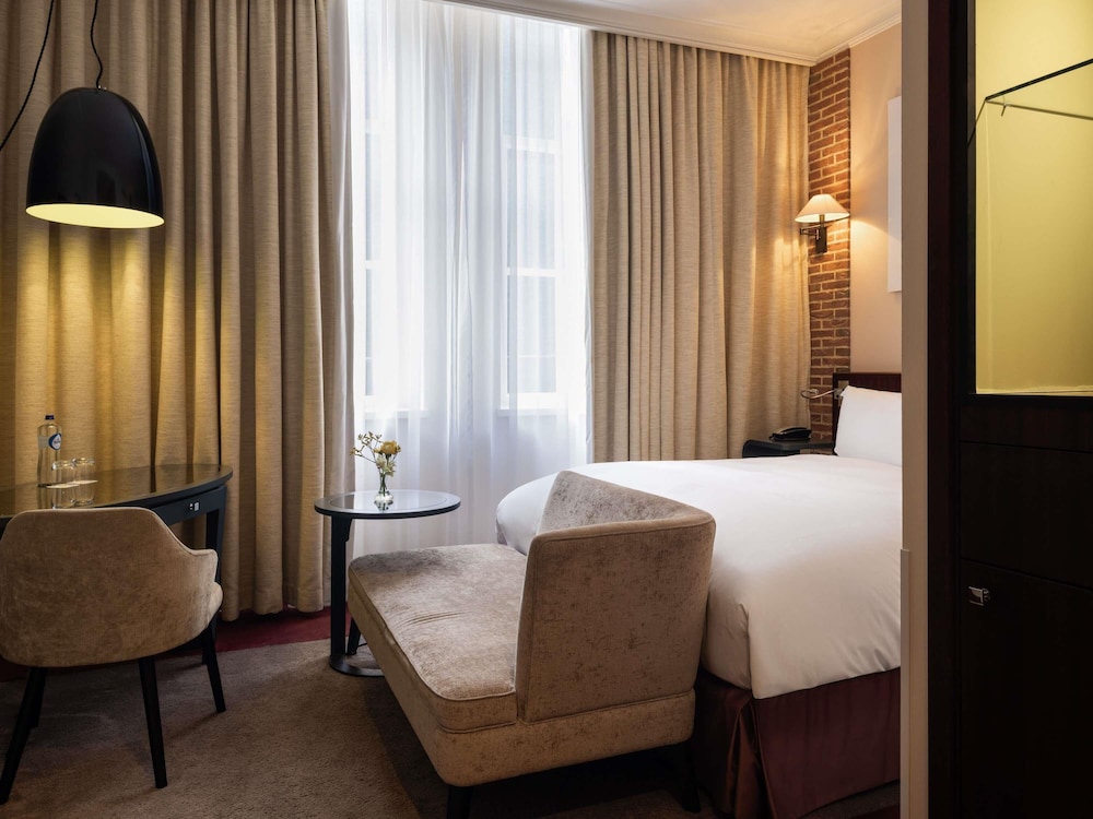 HABITACIÓN CLÁSICA - 1 Cama Doble - VISTAS AL JARDÍN O A LA CIUDAD del hotel Sofitel Legend The Grand Amsterdam. Foto 4
